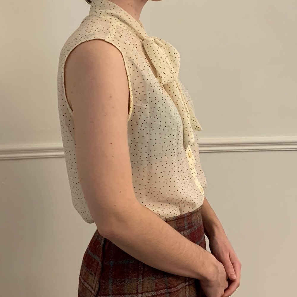 Translucent white blouse with neck bow tie, red and blue polka dots